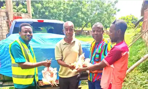 Yilo Krobo hands out local chickens under a government food programme